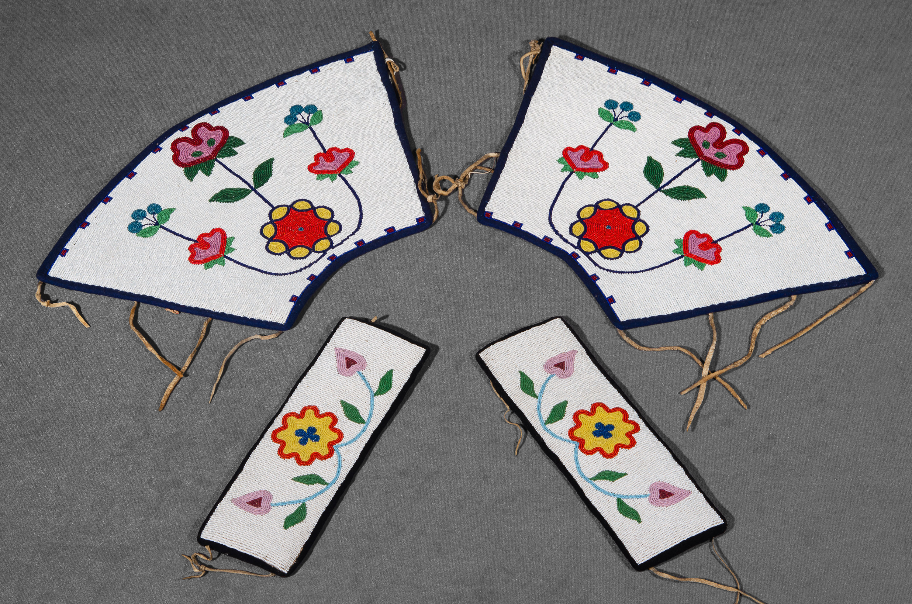 Beaded accessories that feature a colorful floral design on a white background.